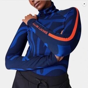 NWOT Sweaty Betty Blue/Orange Patterned Pullover Sweater SIZE MEDIUM